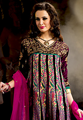 Breathtaking collection of suits with stylish embroidery work and fabulous style. The dazzling dark purple velvet and georgette churidar suit have amazing embroidery patch work is done with resham, zari and stone work. Beautiful embroidery work on kameez is stunning. The entire ensemble makes an excellent wear. Contrasting magenta santoon churidar and magenta chiffon dupatta is available with this suit. Slight Color variations are possible due to differing screen and photograph resolutions.