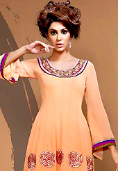 The most beautiful refinements for style and tradition. The dazzling peach georgette churidar suit have amazing embroidery patch work is done with resham, zari, stone and lace work. Beautiful embroidery work on kameez is stunning. Matching santoon churidar and dupatta is available with this suit. Slight Color variations are possible due to differing screen and photograph resolutions.