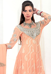Get ready to sizzle all around you by sparkling suit. The dazzling peach georgette churidar suit have amazing embroidery patch work is done with resham, zari and stone work. Beautiful embroidery work on kameez is stunning. The entire ensemble makes an excellent wear. Matching santoon churidar and chiffon dupatta is available with this suit. Slight Color variations are possible due to differing screen and photograph resolutions.
