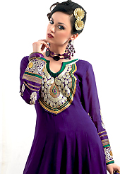 Take a look on the changing fashion of the season. The dazzling purple georgette churidar suit have amazing embroidery patch work is done with resham and zari work. Beautiful embroidery work on kameez is stunning. The entire ensemble makes an excellent wear. Matching santoon churidar and green net dupatta is available with this suit. Slight Color variations are possible due to differing screen and photograph resolutions.