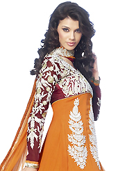 Breathtaking collection of suits with stylish embroidery work and fabulous style. The dazzling orange, red and maroon faux georgette anarkali churidar suit have amazing embroidery patch work is done with resham, zari and lace work. Beautiful embroidery work on kameez is stunning. The entire ensemble makes an excellent wear. Matching orange santoon churidar and orange chiffon dupatta is available with this suit. Slight Color variations are possible due to differing screen and photograph resolutions.