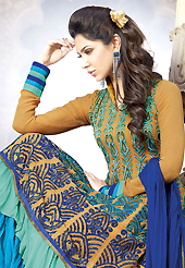 The glamorous silhouette to meet your most dire fashion needs. The dazzling fawn and blue faux georgette churidar suit have amazing embroidery patch work is done with resham, sequins and lace work. Beautiful embroidery work on kameez is stunning. The entire ensemble makes an excellent wear. Matching santoon churidar and blue chiffon dupatta is available with this suit. Slight Color variations are possible due to differing screen and photograph resolutions.