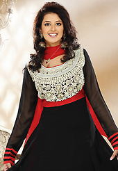 A desire that evokes a sense of belonging with a striking details. The dazzling black faux georgette readymade anarkali churidar suit have amazing embroidery patch work is done with resham, zari, beads and lace work. The entire ensemble makes an excellent wear. Matching churidar and red dupatta is available with this suit. Slight Color variations are possible due to differing screen and photograph resolutions.