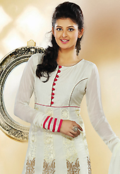 The glamorous silhouette to meet your most dire fashion needs. The dazzling off white faux georgette readymade churidar suit have amazing embroidery patch work is done with resham and zari work. The entire ensemble makes an excellent wear. Matching churidar and dupatta is available with this suit. Slight Color variations are possible due to differing screen and photograph resolutions.
