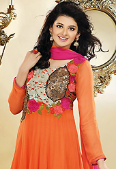 A desire that evokes a sense of belonging with a striking details. The dazzling dark orange faux georgette readymade anarkali churidar suit have amazing embroidery patch work is done with resham, zari, sequins and beads work. The entire ensemble makes an excellent wear. Matching churidar and shaded dupatta is available with this suit. Slight Color variations are possible due to differing screen and photograph resolutions.