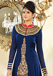 Get ready to sizzle all around you by sparkling suit. The dazzling dark blue faux georgette readymade churidar suit have amazing embroidery patch work is done with resham, zari, sequins, stone, beads, cutdana and lace work. The entire ensemble makes an excellent wear. Matching churidar and dupatta is available with this suit. Slight Color variations are possible due to differing screen and photograph resolutions.