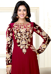 Breathtaking collection of suits with stylish embroidery work and fabulous style. The dazzling maroon faux georgette and velvet anarkali churidar suit have amazing embroidery patch work is done with resham, zari, stone and lace work. Beautiful embroidery work on kameez is stunning. The entire ensemble makes an excellent wear. Matching santoon churidar and faux chiffon dupatta is available with this suit. Slight Color variations are possible due to differing screen and photograph resolutions.