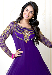 Your search for elegant look ends here with this lovely suit. The dazzling purple faux georgette anarkali churidar suit have amazing embroidery patch work is done with resham, zari, stone and lace work. Beautiful embroidery work on kameez is stunning. The entire ensemble makes an excellent wear. Matching santoon churidar and faux chiffon dupatta is available with this suit. Slight Color variations are possible due to differing screen and photograph resolutions.