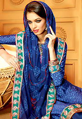 This season dazzle and shine in pure colors. The dazzling blue faux crepe churidar suit have amazing embroidery patch work is done with zari, stone and lace work. The entire ensemble makes an excellent wear. Matching santoon churidar and dupatta is available with this suit. Slight Color variations are possible due to differing screen and photograph resolutions.