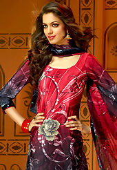 Dreamy variation on shape and forms compliment your style with tradition. The dazzling red and dark grey faux crepe churidar suit have amazing floral print, sequins and stone work. The entire ensemble makes an excellent wear. Contrasting black churidar and shaded red dupatta is available with this suit. Slight Color variations are possible due to differing screen and photograph resolutions.