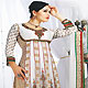 Off White Faux Georgette Readymade Churidar Kameez with Dupatta