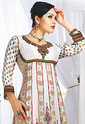 Outfit is a novel ways of getting yourself noticed. The dazzling off white faux georgette readymade churidar suit have amazing embroidery and silk patch bordered work is done with resham, sequins, stone, cutdana, cutmoti, gota patti, kasab and lace work. Beautiful embroidery work on kameez is stunning. The entire ensemble makes an excellent wear. Contrasting red santoon churidar and white faux georgette dupatta is available with this suit. Slight Color variations are possible due to differing screen and photograph resolutions.