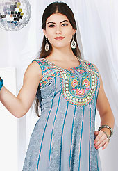 Take the fashion industry by storm in this beautiful embroidered suit. The dazzling grey faux georgette readymade churidar suit have amazing embroidery and silk patch bordered work is done with resham, sequins, stone, cutdana, gota patti and kasab work. Beautiful embroidery work on kameez is stunning. The entire ensemble makes an excellent wear. Contrasting teal blue santoon churidar and double dye dupatta is available with this suit. Slight Color variations are possible due to differing screen and photograph resolutions.