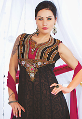 Ultimate collection of embroidered suits with fabulous style. The dazzling black net readymade churidar suit have amazing embroidery patch work is done with stone, cutdana, kasab, kundan, pull moti and lace work. Beautiful embroidery work on kameez is stunning. The entire ensemble makes an excellent wear. Contrasting red santoon churidar and red net dupatta is available with this suit. Slight Color variations are possible due to differing screen and photograph resolutions.