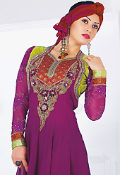Dreamy variation on shape and forms compliment your style with tradition. The dazzling magenta faux georgette readymade churidar suit have amazing embroidery and velvet patch work is done with resham, stone, cutdana, cut moti, kundan and lace work. Beautiful embroidery work on kameez is stunning. The entire ensemble makes an excellent wear. Matching santoon churidar and shaded net dupatta is available with this suit. Slight Color variations are possible due to differing screen and photograph resolutions.