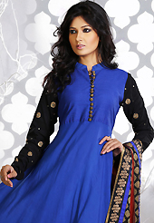 Take a look on the changing fashion of the season. The dazzling blue and black georgette readymade anarkali churidar suit have amazing embroidery patch work is done with zari, stone and lace work. Beautiful embroidery work on kameez is stunning. The entire ensemble makes an excellent wear. Matching black churidar and maroon dupatta is available with this suit. Slight Color variations are possible due to differing screen and photograph resolutions.
