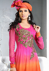 Breathtaking collection of suits with stylish embroidery work and fabulous style. The dazzling shaded pink and orange georgette readymade anarkali churidar suit have amazing embroidery patch work is done with zari, sequins, stone and lace work. Beautiful embroidery work on kameez is stunning. The entire ensemble makes an excellent wear. Matching dark pink santoon churidar and orange dupatta is available with this suit. Slight Color variations are possible due to differing screen and photograph resolutions.