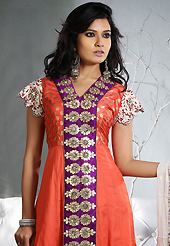 Breathtaking collection of suits with stylish embroidery work and fabulous style. The dazzling dark orange cotton readymade churidar suit have amazing embroidery patch work is done with zari, applique and sequins work. Beautiful embroidery work on kameez is stunning. The entire ensemble makes an excellent wear. Contrasting dark purple churidar and off white dupatta is available with this suit. Slight Color variations are possible due to differing screen and photograph resolutions.