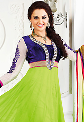 Breathtaking collection of suits with stylish embroidery work and fabulous style. The dazzling green and dark blue faux chiffon and velvet anarkali churidar suit have amazing embroidery patch work is done with resham and zari work. Beautiful embroidery work on kameez is stunning. The entire ensemble makes an excellent wear. Matching dark blue santoon churidar and shaded faux georgette dupatta is available with this suit. Slight Color variations are possible due to differing screen and photograph resolutions.