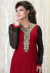 An occasion wear perfect is ready to rock you. The dazzling red faux georgette churidar suit have amazing embroidery patch work is done with resham and zari work. Beautiful embroidery work on kameez is stunning. The entire ensemble makes an excellent wear. Contrasting black santoon churidar and red chiffon dupatta is available with this suit. Slight Color variations are possible due to differing screen and photograph resolutions.