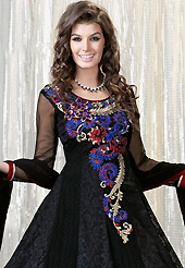 A desire that evokes a sense of belonging with a striking details. The dazzling black faux georgette churidar suit have amazing embroidery patch work is done with resham and stone work. Beautiful embroidery work on kameez is stunning. The entire ensemble makes an excellent wear. Matching santoon churidar and chiffon dupatta is available with this suit. Slight Color variations are possible due to differing screen and photograph resolutions.
