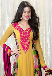 The fascinating beautiful subtly garment with lovely patterns. The dazzling yellow faux georgette churidar suit have amazing floral print and embroidery patch work is done with resham and lace work. Beautiful embroidery work on kameez is stunning. The entire ensemble makes an excellent wear. Contrasting dark pink santoon churidar and dark pink chiffon dupatta is available with this suit. Slight Color variations are possible due to differing screen and photograph resolutions.