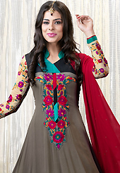 Take a look on the changing fashion of the season. The dazzling dusty grey faux georgette churidar suit have amazing embroidery patch work is done with resham work. Beautiful embroidery work on kameez is stunning. The entire ensemble makes an excellent wear. Contrasting red santoon churidar and red chiffon dupatta is available with this suit. Slight Color variations are possible due to differing screen and photograph resolutions.