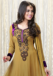 An occasion wear perfect is ready to rock you. The dazzling mustard faux georgette churidar suit have amazing embroidery patch work is done with resham, sequins and stone work. Beautiful embroidery work on kameez is stunning. The entire ensemble makes an excellent wear. Matching santoon churidar and double dye chiffon dupatta is available with this suit. Slight Color variations are possible due to differing screen and photograph resolutions.