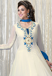 Breathtaking collection of suits with stylish embroidery work and fabulous style. The dazzling off white faux georgette churidar suit have amazing floral print and embroidery patch work is done with resham and lace work. Beautiful embroidery work on kameez is stunning. The entire ensemble makes an excellent wear. Matching santoon churidar and blue chiffon dupatta is available with this suit. Slight Color variations are possible due to differing screen and photograph resolutions.