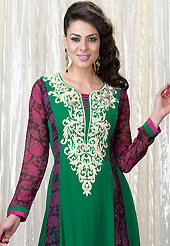 It is color this season and bright shaded suits are really something that is totally in vogue. The dazzling green faux georgette churidar suit have amazing floral print and embroidery patch work is done with resham, stone and lace work. Beautiful embroidery work on kameez is stunning. The entire ensemble makes an excellent wear. Contrasting dark pink santoon churidar and dark pink chiffon dupatta is available with this suit. Slight Color variations are possible due to differing screen and photograph resolutions.