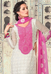 Attract all attentions with this embroidered suit. The dazzling white georgette churidar suit have amazing embroidery patch work is done with resham and lace work. The entire ensemble makes an excellent wear. Matching santoon churidar and pink chiffon dupatta is available with this suit. Slight Color variations are possible due to differing screen and photograph resolutions.