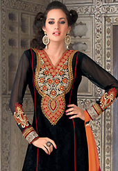 The most beautiful refinements for style and tradition. The dazzling black jacquard churidar suit have amazing embroidery patch work is done with resham and lace work. The entire ensemble makes an excellent wear. Contrasting orange santoon churidar and orange and red chiffon dupatta is available with this suit. Slight Color variations are possible due to differing screen and photograph resolutions.