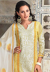 An occasion wear perfect is ready to rock you. The dazzling yellow georgette churidar suit have amazing embroidery patch work is done with resham and lace work. The entire ensemble makes an excellent wear. Matching santoon churidar and off white chiffon dupatta is available with this suit. Slight Color variations are possible due to differing screen and photograph resolutions.