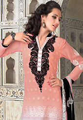 The fascinating beautiful subtly garment with lovely patterns. The dazzling peach and off white georgette churidar suit have amazing embroidery patch work is done with resham work. The entire ensemble makes an excellent wear. Matching santoon churidar and black chiffon dupatta is available with this suit. Slight Color variations are possible due to differing screen and photograph resolutions.
