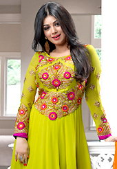 The color range from natural shades looks ravishing. The dazzling pastel green georgette anarkali churidar suit have amazing embroidery patch work is done with resham, zari, stone and lace work. Beautiful embroidery work on kameez is stunning. The entire ensemble makes an excellent wear. Matching santoon churidar and shaded chiffon dupatta is available with this suit. Slight Color variations are possible due to differing screen and photograph resolutions.