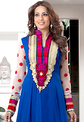 Look stunning rich with dark shades and floral patterns. The dazzling royal blue georgette anarkali churidar suit have amazing embroidery patch work is done with resham and lace work. Beautiful embroidery work on kameez is stunning. The entire ensemble makes an excellent wear. Matching santoon churidar and chiffon dupatta is available with this suit. Slight Color variations are possible due to differing screen and photograph resolutions.