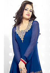 The fascinating beautiful subtly garment with lovely patterns. The dazzling blue georgette anarkali churidar suit have amazing embroidery patch work is done with resham and lace work. Beautiful embroidery work on kameez is stunning. The entire ensemble makes an excellent wear. Matching santoon churidar and chiffon dupatta is available with this suit. Slight Color variations are possible due to differing screen and photograph resolutions.
