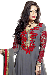 Your search for elegant look ends here with this lovely suit. The dazzling grey georgette anarkali churidar suit have amazing embroidery patch work is done with resham and zari work. Beautiful embroidery work on kameez is stunning. The entire ensemble makes an excellent wear. Matching santoon churidar and chiffon dupatta is available with this suit. Slight Color variations are possible due to differing screen and photograph resolutions.