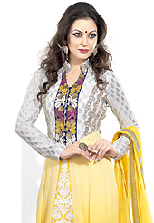 Attract all attentions with this embroidered suit. The dazzling yellow and white georgette anarkali churidar suit have amazing embroidery patch work is done with resham and zari work. Beautiful embroidery work on kameez is stunning. The entire ensemble makes an excellent wear. Matching yellow santoon churidar and yellow chiffon dupatta is available with this suit. Slight Color variations are possible due to differing screen and photograph resolutions.
