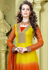 The color range from natural shades looks ravishing. The dazzling yellow and dark orange net churidar suit have amazing embroidery patch work is done with resham, zari and sequins work. Beautiful embroidery work on kameez is stunning. The entire ensemble makes an excellent wear. Matching dark orange santoon churidar and dark orange faux chiffon dupatta is available with this suit. Slight Color variations are possible due to differing screen and photograph resolutions.