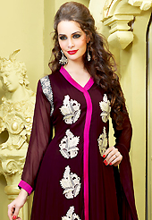 Outfit is a novel ways of getting yourself noticed. The dazzling deep brown faux georgette churidar suit have amazing embroidery patch work is done with resham and zari work. Beautiful embroidery work on kameez is stunning. The entire ensemble makes an excellent wear. Matching santoon churidar and faux chiffon dupatta is available with this suit. Slight Color variations are possible due to differing screen and photograph resolutions.