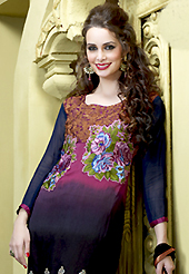 The fascinating beautiful subtly garment with lovely patterns. The dazzling shaded magenta and black faux georgette churidar suit have amazing embroidery patch work is done with resham, zari, sequins and stone work. Beautiful embroidery work on kameez is stunning. The entire ensemble makes an excellent wear. Matching dark magenta santoon churidar and black faux chiffon dupatta is available with this suit. Slight Color variations are possible due to differing screen and photograph resolutions.