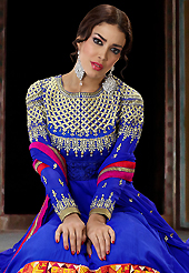 Get ready to sizzle all around you by sparkling suit. The dazzling blue georgette long style anarkali churidar suit have amazing embroidery patch work is done with resham, sequins and stone work. Beautiful embroidery work on kameez is stunning. The entire ensemble makes an excellent wear. Matching santoon churidar and chiffon dupatta is available with this suit. Slight Color variations are possible due to differing screen and photograph resolutions.