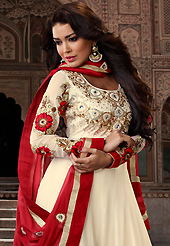 The color range from natural shades looks ravishing. The dazzling cream georgette long style anarkali churidar suit have amazing embroidery patch work is done with resham, sequins and stone work. Beautiful embroidery work on kameez is stunning. The entire ensemble makes an excellent wear. Matching santoon churidar and red chiffon dupatta is available with this suit. Slight Color variations are possible due to differing screen and photograph resolutions.