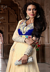 The glamorous silhouette to meet your most dire fashion needs. The dazzling cream and pink net long style anarkali churidar suit have amazing embroidery patch work is done with resham, sequins and stone work. Beautiful embroidery work on kameez is stunning. The entire ensemble makes an excellent wear. Matching santoon churidar and chiffon dupatta is available with this suit. Slight Color variations are possible due to differing screen and photograph resolutions.