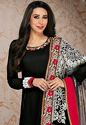 It is color this season and bright shaded suits are really something that is totally in vogue. The dazzling black georgette churidar suit have amazing embroidery patch work is done with resham work. Beautiful embroidery work on kameez is stunning. The entire ensemble makes an excellent wear. Contrasting red santoon churidar and black and cream net dupatta is available with this suit. Slight Color variations are possible due to differing screen and photograph resolutions.