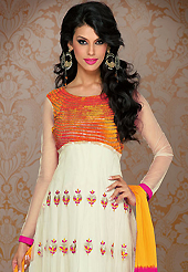 A desire that evokes a sense of belonging with a striking details. The dazzling cream net anarkali churidar suit have amazing embroidery patch work is done with resham, zari and sequins work. Beautiful embroidery work on kameez is stunning. The entire ensemble makes an excellent wear. Contrasting pink santoon churidar and yellow and pink chiffon dupatta is available with this suit. Slight Color variations are possible due to differing screen and photograph resolutions.