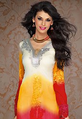 Dreamy variation on shape and forms compliment your style with tradition. The dazzling shaded cream, orange and red georgette churidar suit have amazing embroidery patch work is done with resham, sequins, stone and lace work. Beautiful embroidery work on kameez is stunning. The entire ensemble makes an excellent wear. Matching red santoon churidar and red chiffon dupatta is available with this suit. Slight Color variations are possible due to differing screen and photograph resolutions.