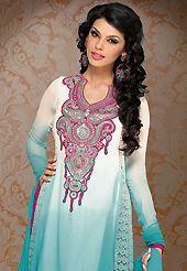 The fascinating beautiful subtly garment with lovely patterns. The dazzling shaded off white and light blue georgette churidar suit have amazing embroidery patch work is done with resham, stone and lace work. Beautiful embroidery work on kameez is stunning. The entire ensemble makes an excellent wear. Contrasting dark pink santoon churidar and light blue chiffon dupatta is available with this suit. Slight Color variations are possible due to differing screen and photograph resolutions.