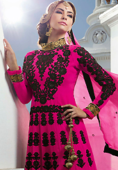 Look stunning rich with dark shades and floral patterns. The dazzling dark pink georgette anarkali churidar suit have amazing embroidery and velvet patch work is done with resham, zari and stone work. Beautiful embroidery work on kameez is stunning. The entire ensemble makes an excellent wear. Matching santoon churidar and chiffon dupatta is available with this suit. Slight Color variations are possible due to differing screen and photograph resolutions.